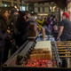 Customers buy traditional Hungarian kürtőskalács at Vorosmarty Square Christmas market in Budapest, Hungary.